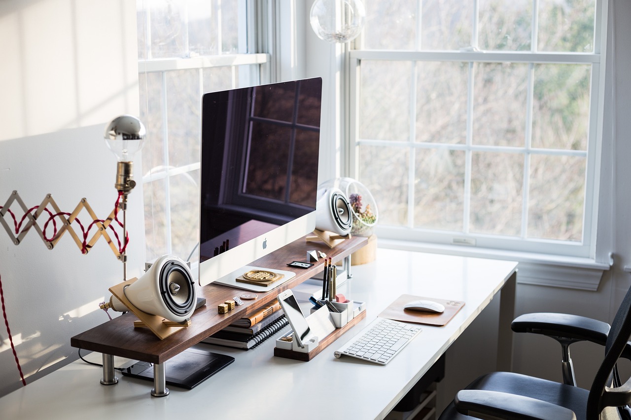 Computer, keyboard, apple — The HRMS's Positive Effects on Your Organisation