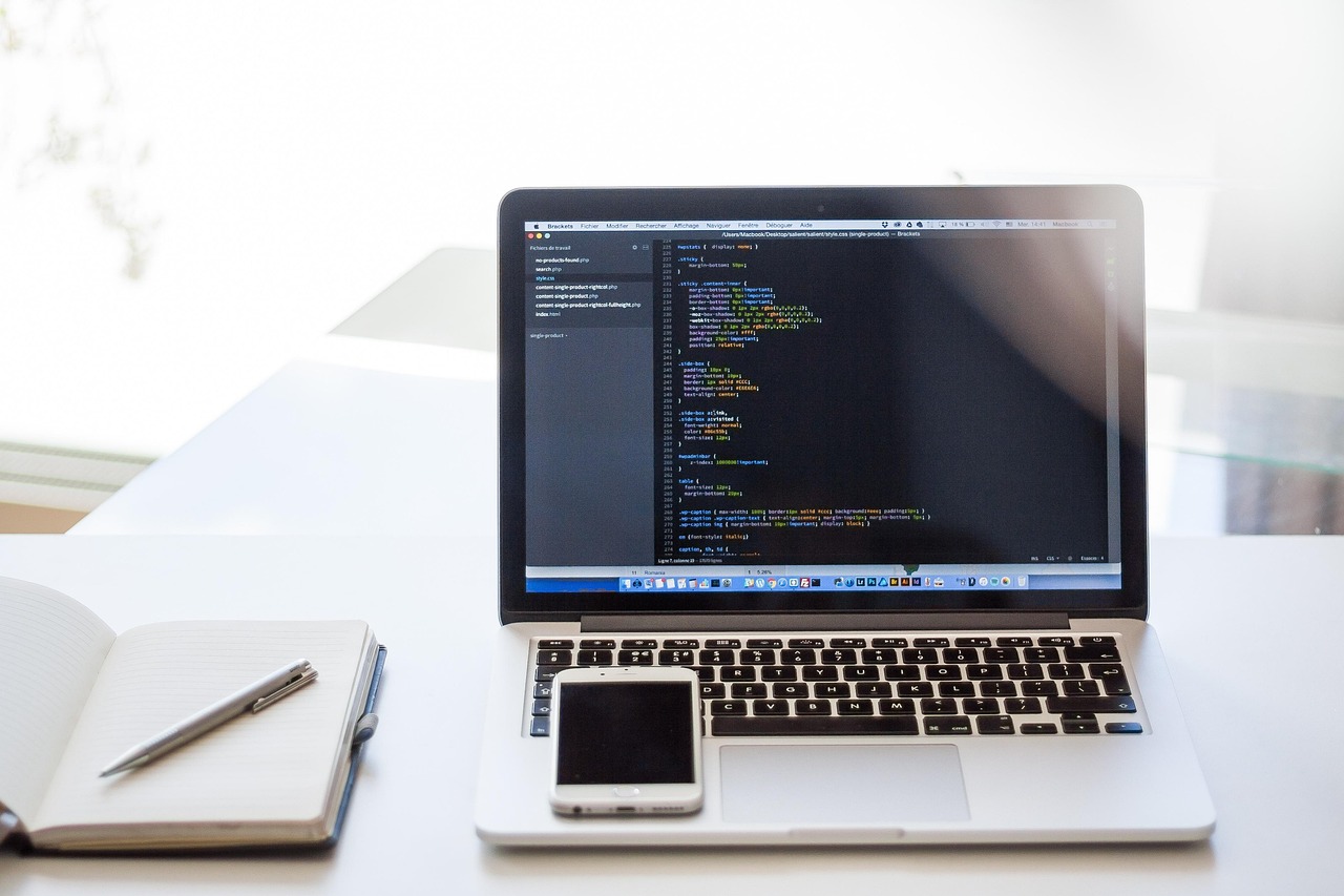 Laptop, notebook, cellphone — Things to Know About A Mobile App Development Company